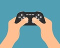 Male hands holding gamepad controller and playing video game, vector on green background Royalty Free Stock Photo