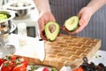 Male Hands Holding Green Avocado Fruit Halves Royalty Free Stock Photo