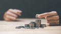 Male hands holding money coins,concept of saving and accumulating money ,Financial planning and investment ,growth in assets and Royalty Free Stock Photo