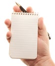 Male Hands Holding Pen and Pad of Paper