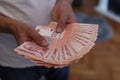 Grasping Prosperity: Male Hands Holding a Stack of Serbian Dinar Currency Royalty Free Stock Photo