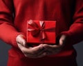 male hands holding a red gift box to a woman, female holiday gift generative ai Royalty Free Stock Photo