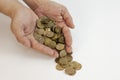 Male hands holding Russian iron coins close up on a white background. Russia crisis. small currency Royalty Free Stock Photo