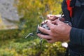 male hands holding sticks on the remote control of a drone, close-up, outdoors Royalty Free Stock Photo