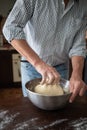 male hands making bread in kitchen at home Royalty Free Stock Photo