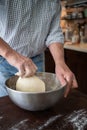 male hands making bread in kitchen at home Royalty Free Stock Photo