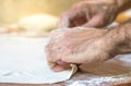 Male hands making dough on the table in the kitchen at home Royalty Free Stock Photo