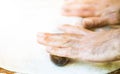 Male hands making dough on the table in the kitchen at home Royalty Free Stock Photo