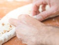 Male hands making dough on the table in the kitchen at home Royalty Free Stock Photo