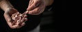 male hands making pasta powdering by flour on a dark background. home cooking concept. Long banner format