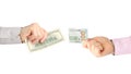 Male hands with money opposite each other on a white background. business relationship. salary Royalty Free Stock Photo