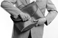Male hands open brown leather bag. Academic style and business