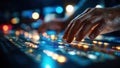 Male Hands Operating Sound Mixing Board in Studio with Bright Lights Royalty Free Stock Photo