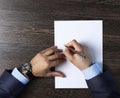 Male hands with pen over document Royalty Free Stock Photo