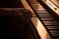 male hands on the piano keys closeup of a beautiful colorful background Royalty Free Stock Photo