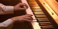 male hands on the piano keys closeup of a beautiful colorful background Royalty Free Stock Photo
