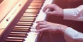 Male hands on the piano keys closeup of a beautiful colorful background Royalty Free Stock Photo