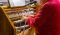 Hands playing organ keyboard Royalty Free Stock Photo