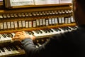 Hands playing organ keyboard Royalty Free Stock Photo