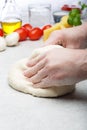 Male hands preparing the dough for pizza Royalty Free Stock Photo