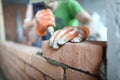 Male hands putting bricks Royalty Free Stock Photo