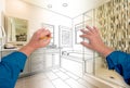 Male Hands Sketching Beautiful Custom Bathroom Gradating to Finished Construction Royalty Free Stock Photo