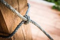 Male hands tie a rope tree,Rope knot line tied together with nature background,as a symbol for trust Royalty Free Stock Photo