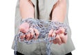 Male hands tied with chains Royalty Free Stock Photo