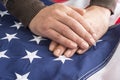 Male hands touch the flag of the United States of America Royalty Free Stock Photo