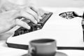 Male hands type story or report using white vintage typewriter equipment close up. Writing routine. Vintage typewriter Royalty Free Stock Photo