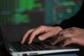 Male hands typing computer code, security program for database or servers Royalty Free Stock Photo
