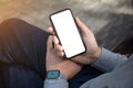 Male hands with watch holding phone isolated screen in park Royalty Free Stock Photo