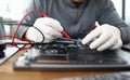 Male hands in white protective glove hold Royalty Free Stock Photo