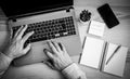 Male hands working on modern laptop. Working at home on the Desk with laptop, agenda, pen, post it and smartphone. Businessman Royalty Free Stock Photo