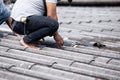 Male handyman repairing the roof Royalty Free Stock Photo