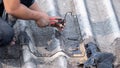 Male handyman repairing the roof Royalty Free Stock Photo