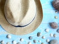 Male hat close-up, sea shells, sea stones Summer vacation concept Royalty Free Stock Photo