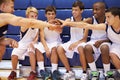 Male High School Basketball Team Having Team Talk With Coach Royalty Free Stock Photo