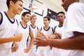 Male High School Basketball Team Having Team Talk With Coach Royalty Free Stock Photo