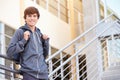 Male High School Student Standing Outside Building Royalty Free Stock Photo