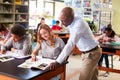 Male High School Tutor Teaching Students In Biology Class Royalty Free Stock Photo