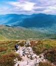 A male hiker hiking on Lion Head trail on Mt. Washington Royalty Free Stock Photo