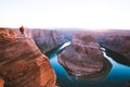 Male hiker overlooking Horseshoe Bend at sunset, Arizona, USA Royalty Free Stock Photo