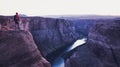 Male hiker overlooking Horseshoe Bend in twilight, Arizona, USA Royalty Free Stock Photo