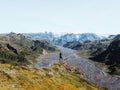 Male hiker overlooking a scenic mountain landscape in the countryside