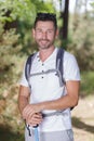 male hiker posing and smiling