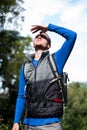 Male hiker shielding his eyes Royalty Free Stock Photo