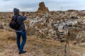 Male hiker takes photo of Unesco World Heritage, Cappadocia, Turkey