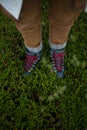 Male hiking boots emerged in moss Royalty Free Stock Photo