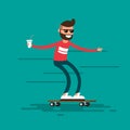The male hipster rides on a skateboard